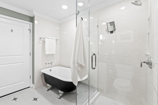 100 3rd Ave S Unit 805, Minneapolis, MN 55401 - bathroom featuring a stall shower, crown molding, a freestanding tub, tile patterned flooring, and recessed lighting