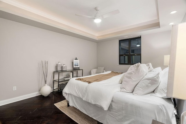 100 3rd Ave S Unit 805, Minneapolis, MN 55401 - bedroom with a raised ceiling, dark wood-style floors, recessed lighting, and ceiling fan