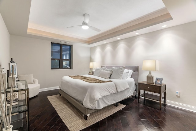 100 3rd Ave S Unit 805, Minneapolis, MN 55401 - bedroom featuring a tray ceiling, hardwood / wood-style flooring, ornamental molding, a ceiling fan, and recessed lighting