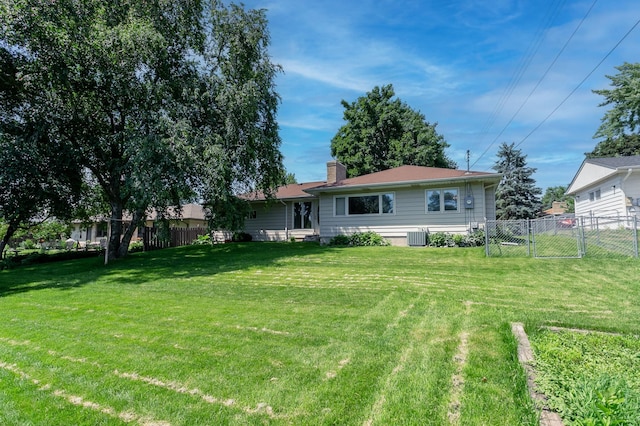 2808 34th Ave NE, Saint Anthony, MN 55418 - back of house with a chimney