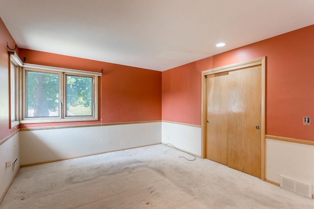 2808 34th Ave NE, Saint Anthony, MN 55418 - spare room featuring carpet and baseboards
