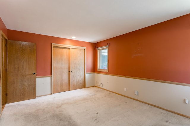 2808 34th Ave NE, Saint Anthony, MN 55418 - unfurnished bedroom featuring a closet and carpet