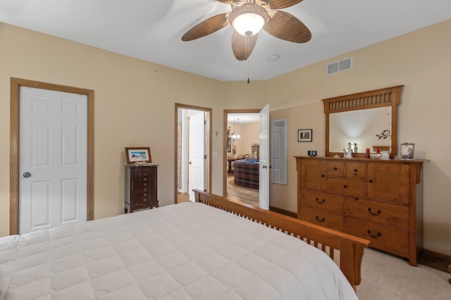 6511 98th Ln N, Brooklyn Park, MN 55445 - bedroom with light colored carpet and ceiling fan
