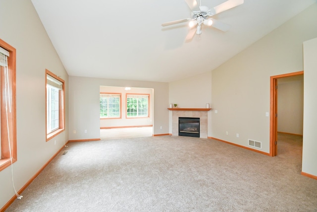 11812 37th St NE, Saint Michael, MN 55376 - unfurnished living room with vaulted ceiling, a fireplace, carpet floors, and ceiling fan