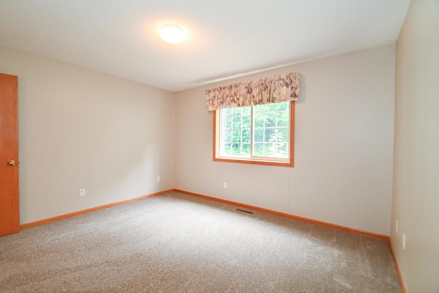 11812 37th St NE, Saint Michael, MN 55376 - carpeted spare room featuring baseboards