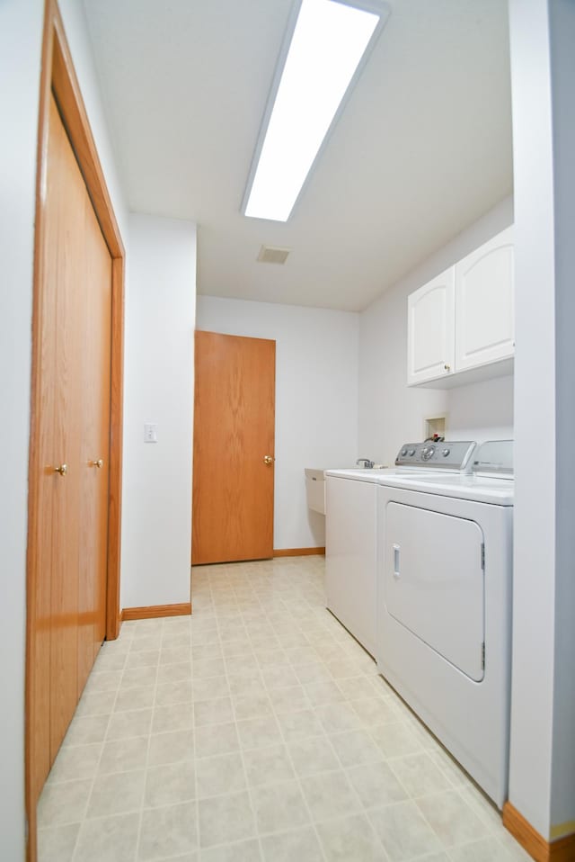 11812 37th St NE, Saint Michael, MN 55376 - laundry area with cabinet space and washing machine and dryer