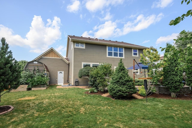 16615 54th Ave N, Plymouth, MN 55446 - back of house featuring a storage shed and a yard