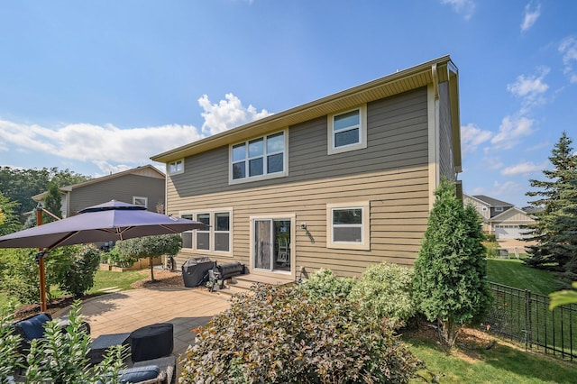 16615 54th Ave N, Plymouth, MN 55446 - rear view of property featuring a patio area and an outdoor living space