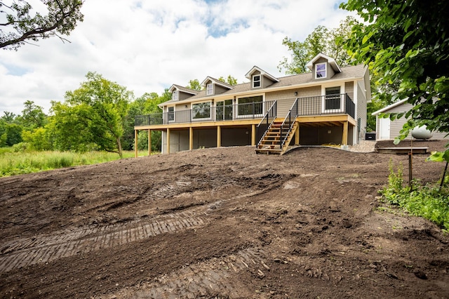 7591 Lake Ida Way NW, Alexandria, MN 56308 - view of front of house with a deck and stairs