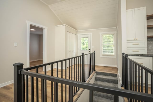 7591 Lake Ida Way NW, Alexandria, MN 56308 - stairway with wood finished floors and vaulted ceiling