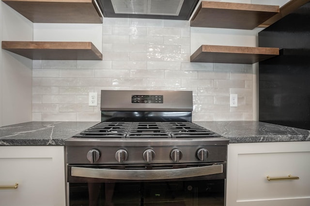 7591 Lake Ida Way NW, Alexandria, MN 56308 - kitchen featuring stainless steel gas stove, open shelves, backsplash, and dark stone countertops