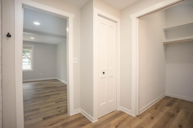 7591 Lake Ida Way NW, Alexandria, MN 56308 - corridor featuring light wood-type flooring and recessed lighting