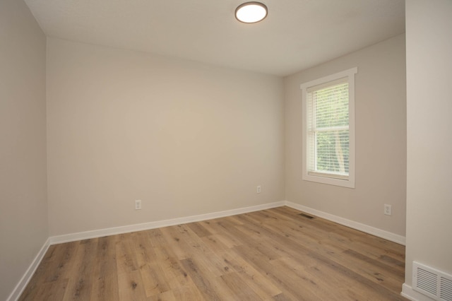 7591 Lake Ida Way NW, Alexandria, MN 56308 - unfurnished room featuring light wood-type flooring and baseboards