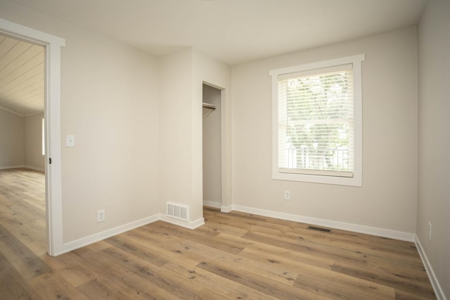 7591 Lake Ida Way NW, Alexandria, MN 56308 - unfurnished bedroom with light wood-style floors and baseboards