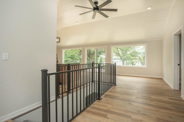 7591 Lake Ida Way NW, Alexandria, MN 56308 - corridor with an upstairs landing, healthy amount of natural light, lofted ceiling, wood finished floors, and wood ceiling