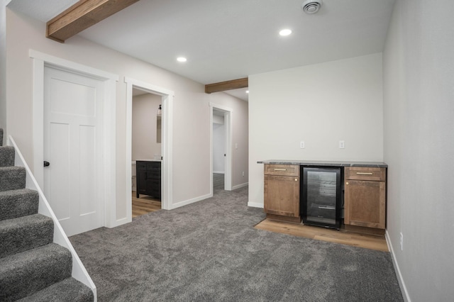 7591 Lake Ida Way NW, Alexandria, MN 56308 - indoor dry bar with beverage cooler, light colored carpet, stairs, recessed lighting, and beamed ceiling
