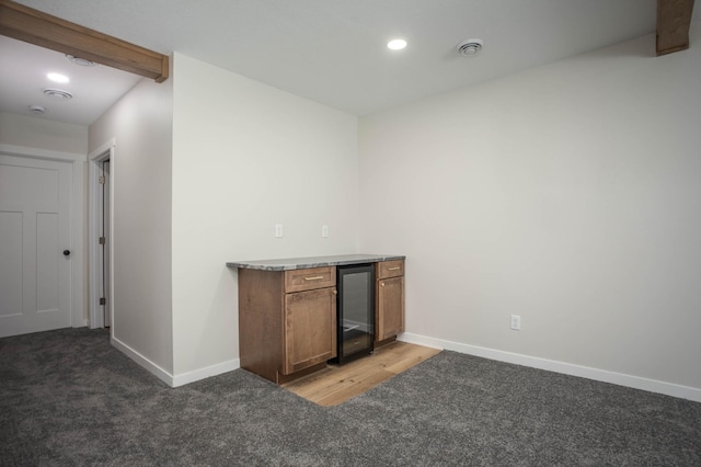 7591 Lake Ida Way NW, Alexandria, MN 56308 - indoor bar featuring beverage cooler, light carpet, and recessed lighting