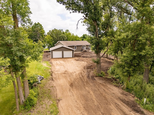 7591 Lake Ida Way NW, Alexandria, MN 56308 - view of front facade featuring driveway and a garage