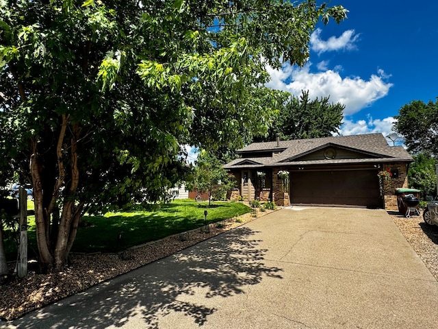 6314 112th Pl N, Champlin, MN 55316 - view of front of house with an attached garage, concrete driveway, a front yard, brick siding, and roof with shingles