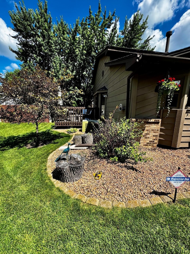 6314 112th Pl N, Champlin, MN 55316 - view of grassy yard featuring a deck