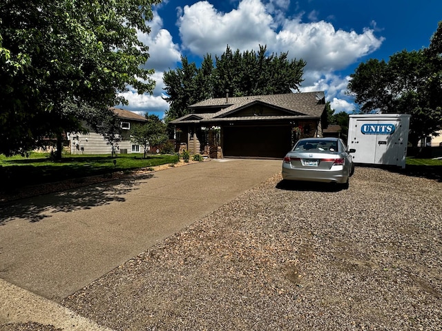6314 112th Pl N, Champlin, MN 55316 - view of front of house featuring concrete driveway and an attached garage