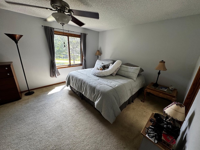 6314 112th Pl N, Champlin, MN 55316 - bedroom with carpet, a textured ceiling, and ceiling fan