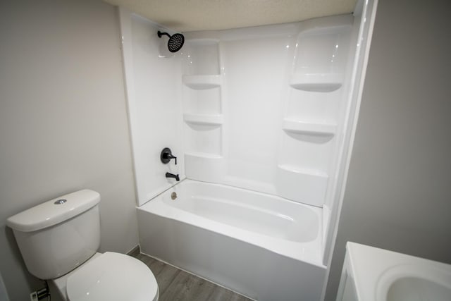 422 Park Ave, Sandstone, MN 55072 - full bathroom with wood finished floors, vanity, and shower / washtub combination