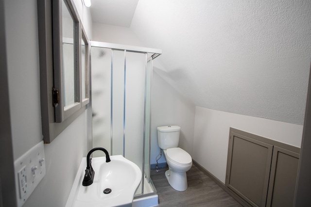 422 Park Ave, Sandstone, MN 55072 - full bath featuring wood finished floors and a stall shower