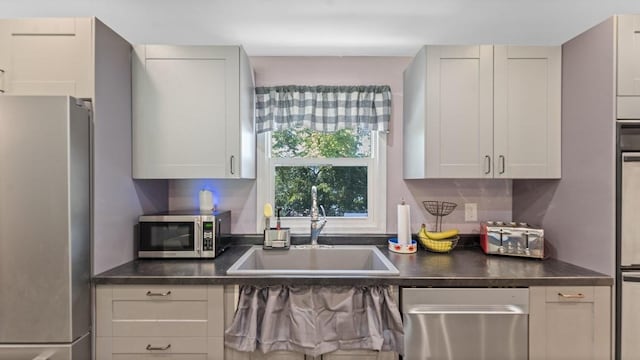 19421 708th Ave, Dassel, MN 55325 - kitchen with stainless steel appliances and dark countertops