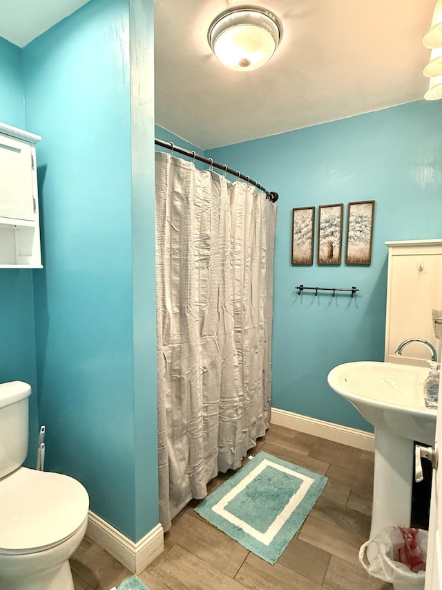 19421 708th Ave, Dassel, MN 55325 - bathroom with wood finished floors and a shower with curtain