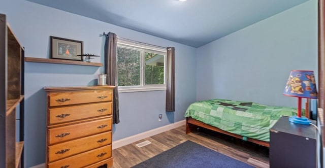 19421 708th Ave, Dassel, MN 55325 - bedroom featuring wood finished floors and baseboards