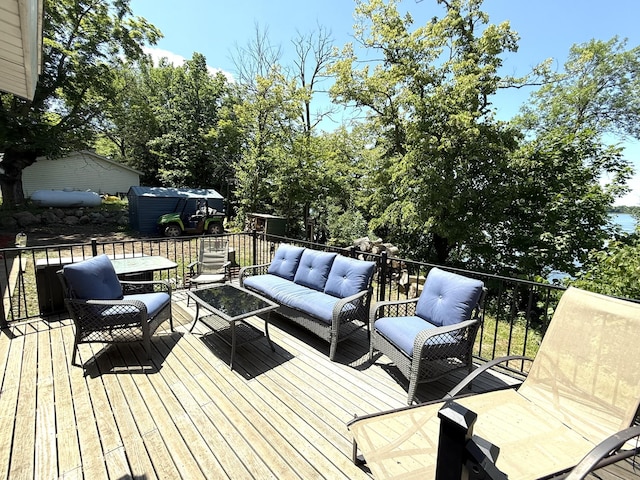 19421 708th Ave, Dassel, MN 55325 - wooden terrace featuring an outdoor living space and a storage shed