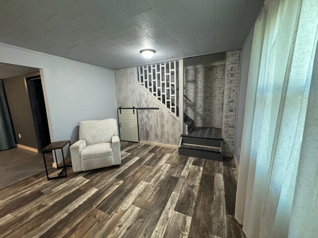 815 6th St N, New Ulm, MN 56073 - sitting room with wood finished floors and stairway