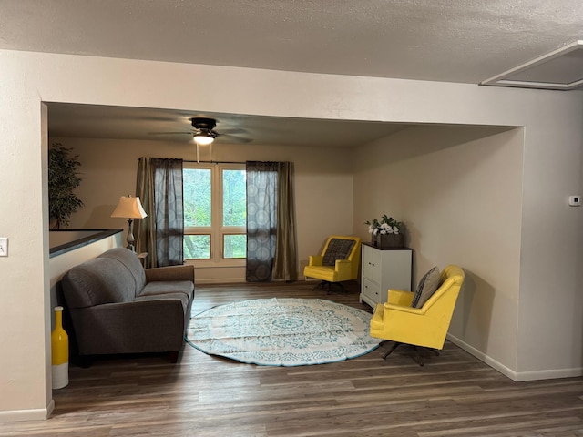 815 6th St N, New Ulm, MN 56073 - living room with wood finished floors, ceiling fan, and a textured ceiling