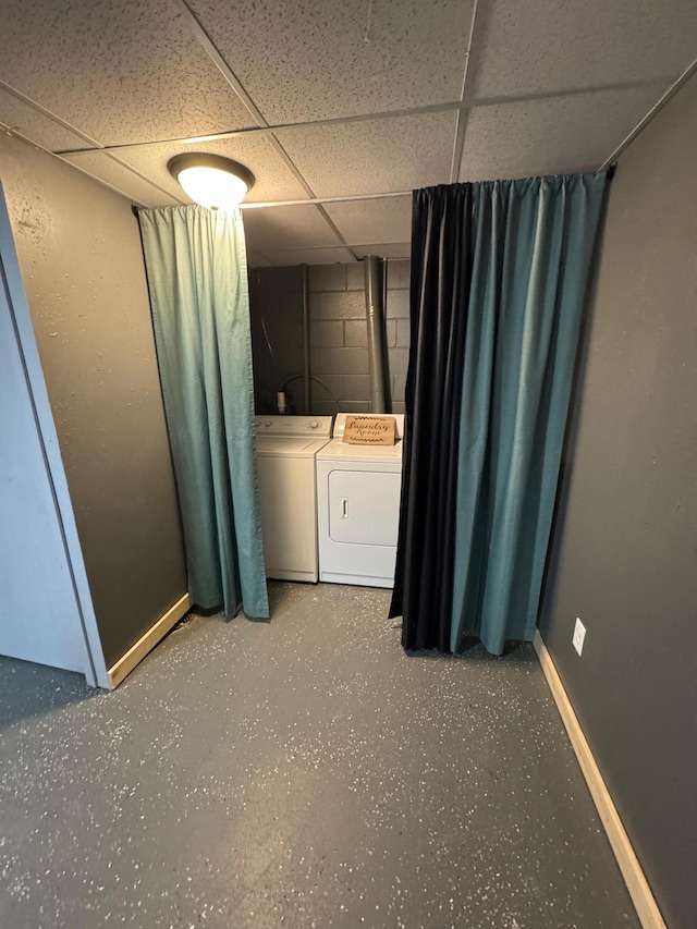 815 6th St N, New Ulm, MN 56073 - laundry room featuring washing machine and clothes dryer and concrete block wall