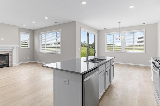 10070 32nd St NE, Saint Michael, MN 55376 - kitchen with appliances with stainless steel finishes, light wood-style floors, a chandelier, plenty of natural light, and recessed lighting