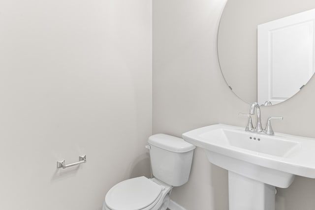 10070 32nd St NE, Saint Michael, MN 55376 - half bathroom featuring toilet and baseboards