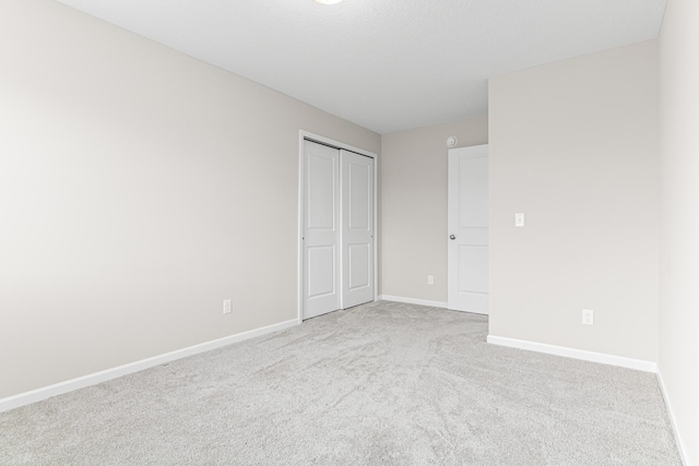 10070 32nd St NE, Saint Michael, MN 55376 - unfurnished bedroom featuring carpet and a closet