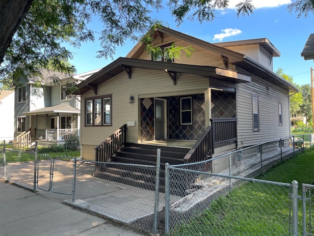 482 Edmund Ave, Saint Paul, MN 55103 - view of front of house with a gate, a porch, and a fenced front yard