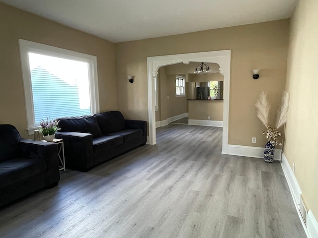 482 Edmund Ave, Saint Paul, MN 55103 - living room with wood finished floors and a chandelier