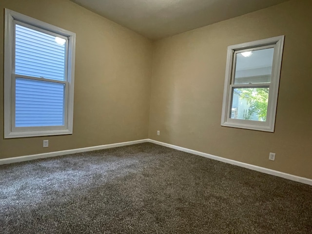 482 Edmund Ave, Saint Paul, MN 55103 - carpeted empty room featuring baseboards