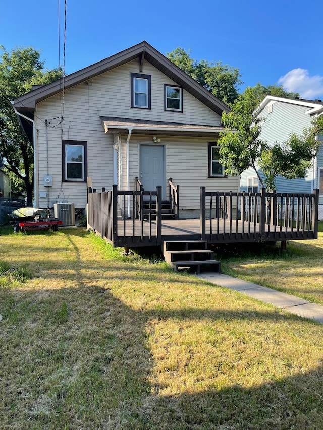 482 Edmund Ave, Saint Paul, MN 55103 - back of house with a deck and a lawn