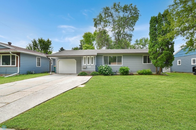 219 10th Ave E, Fargo, ND 58078 - single story home with a garage, driveway, and a front yard