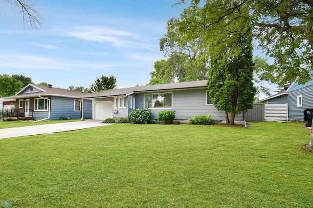 219 10th Ave E, Fargo, ND 58078 - ranch-style home with a garage and driveway
