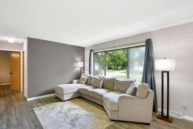 219 10th Ave E, Fargo, ND 58078 - living area featuring wood finished floors
