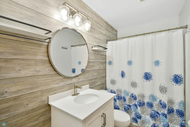 219 10th Ave E, Fargo, ND 58078 - full bath featuring wood walls, vanity, and a shower with shower curtain