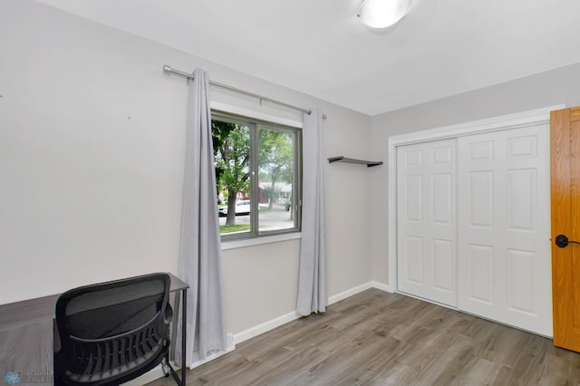 219 10th Ave E, Fargo, ND 58078 - unfurnished bedroom with wood finished floors and a closet