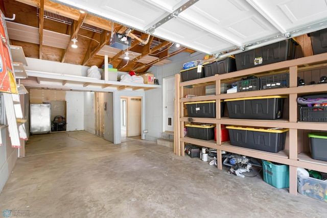 219 10th Ave E, Fargo, ND 58078 - garage with a garage door opener