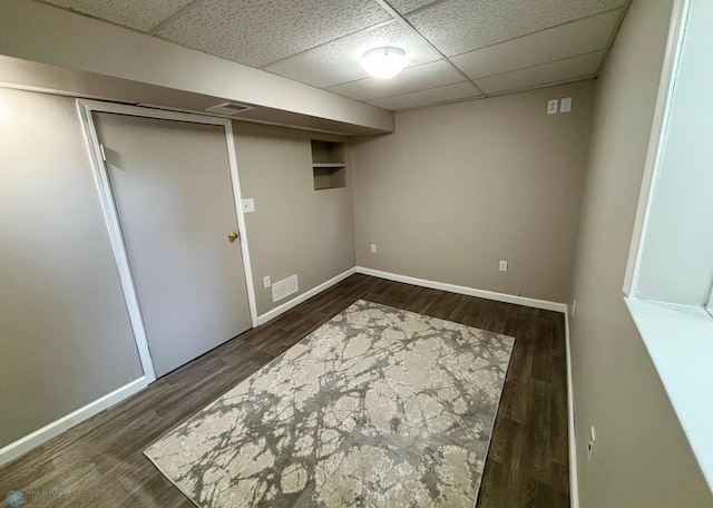 219 10th Ave E, Fargo, ND 58078 - finished below grade area featuring a drop ceiling and wood finished floors
