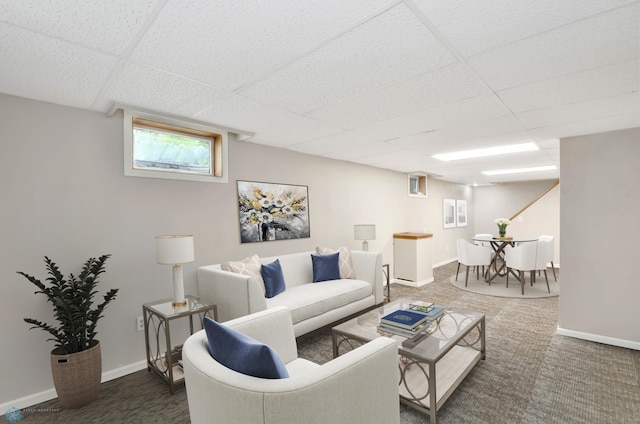 219 10th Ave E, Fargo, ND 58078 - living room featuring a drop ceiling and carpet